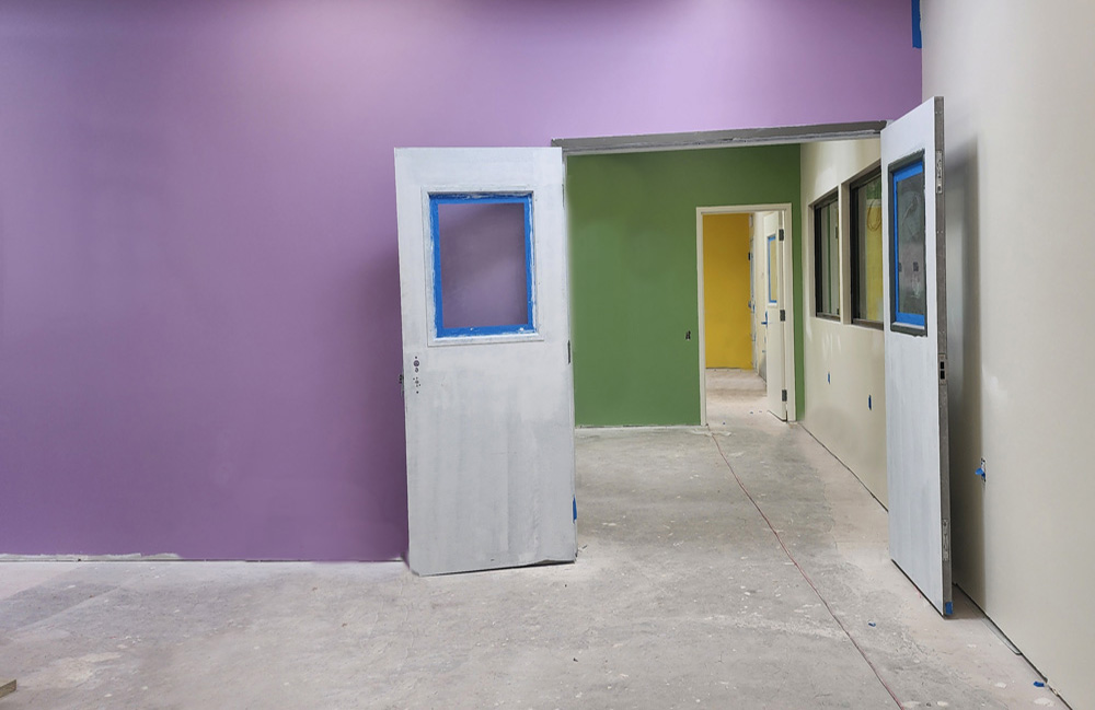 Encore-Sustainable-Architects-CASA-Rockville-Hallway-w-hero Encore-Sustainable-Architects-CASA-Rockville-Hallway